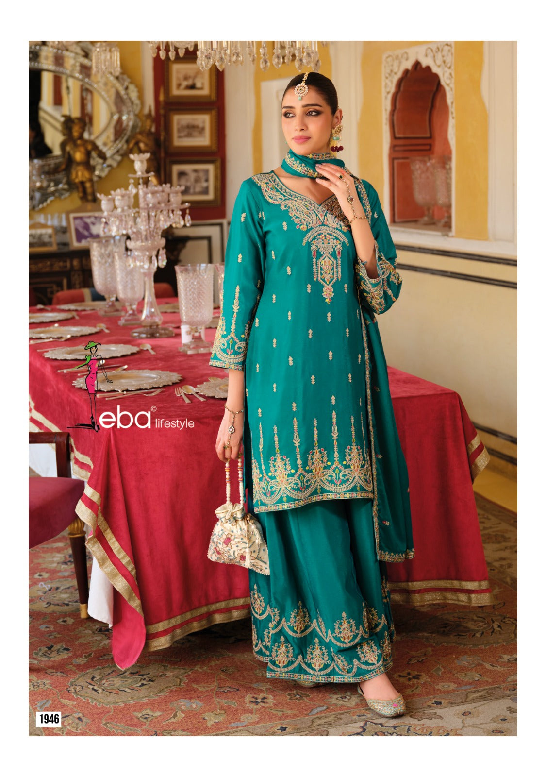 Front of a Model standing wearing a teal Sharara.